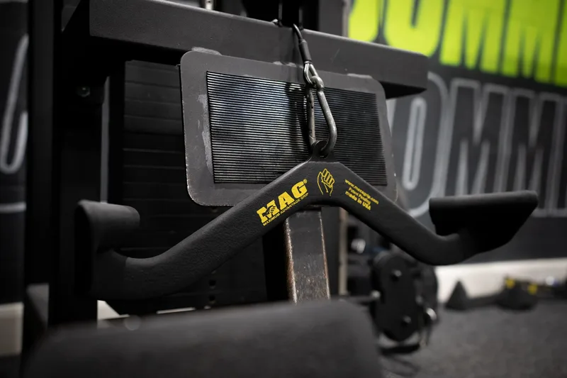 Close-up of a MAG grip attachment at Alpha Athletic gym