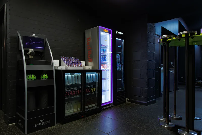Selection of gym drinks and supplements at Alpha Athletic reception