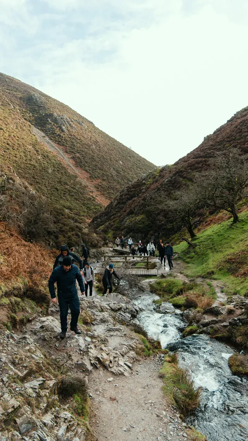 Members of the Alpha Athletic community on a group hike